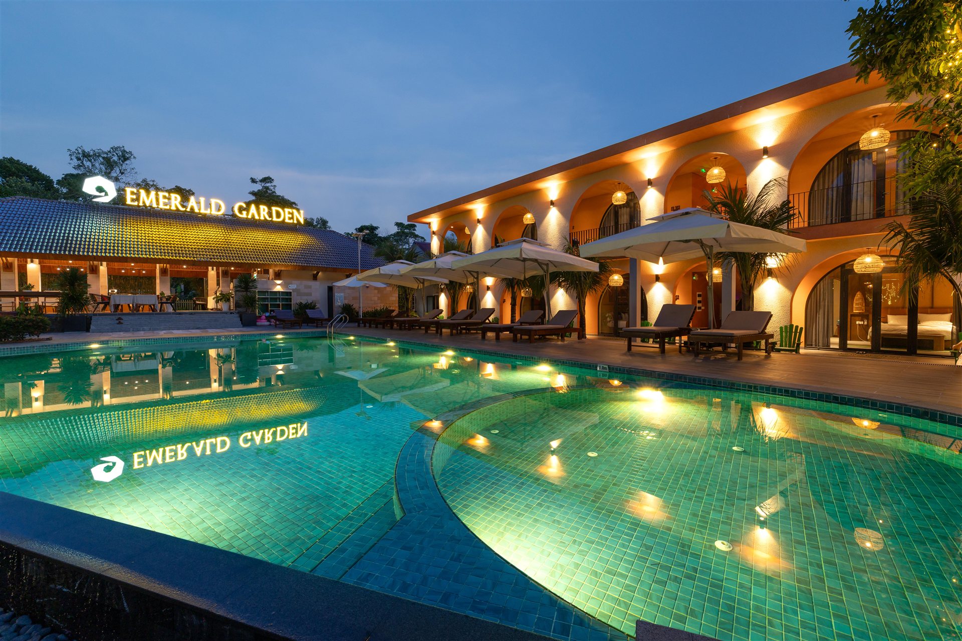 Emerald Garden Retreat swimming pool at twilight