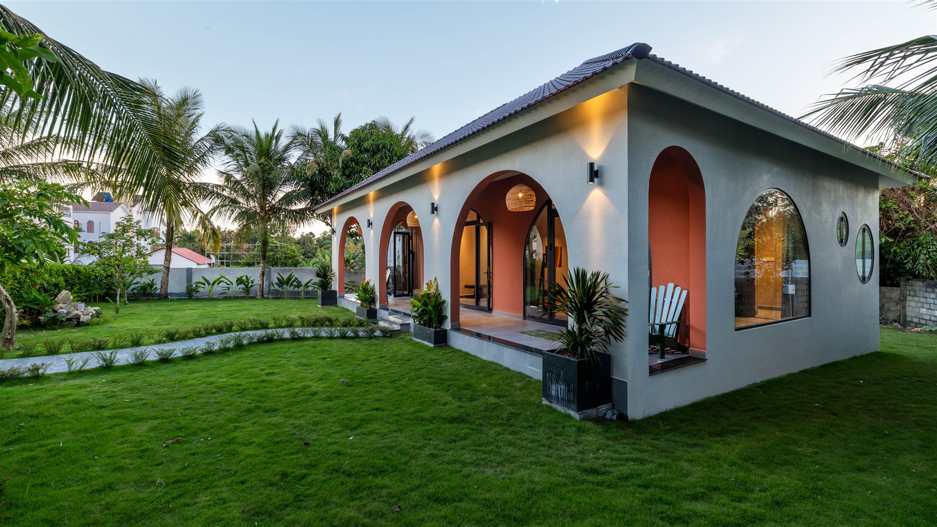 Arched entrances and tropical planting at Emerald Garden Retreat